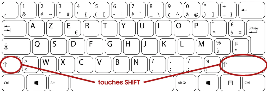 La touche shift du clavier.